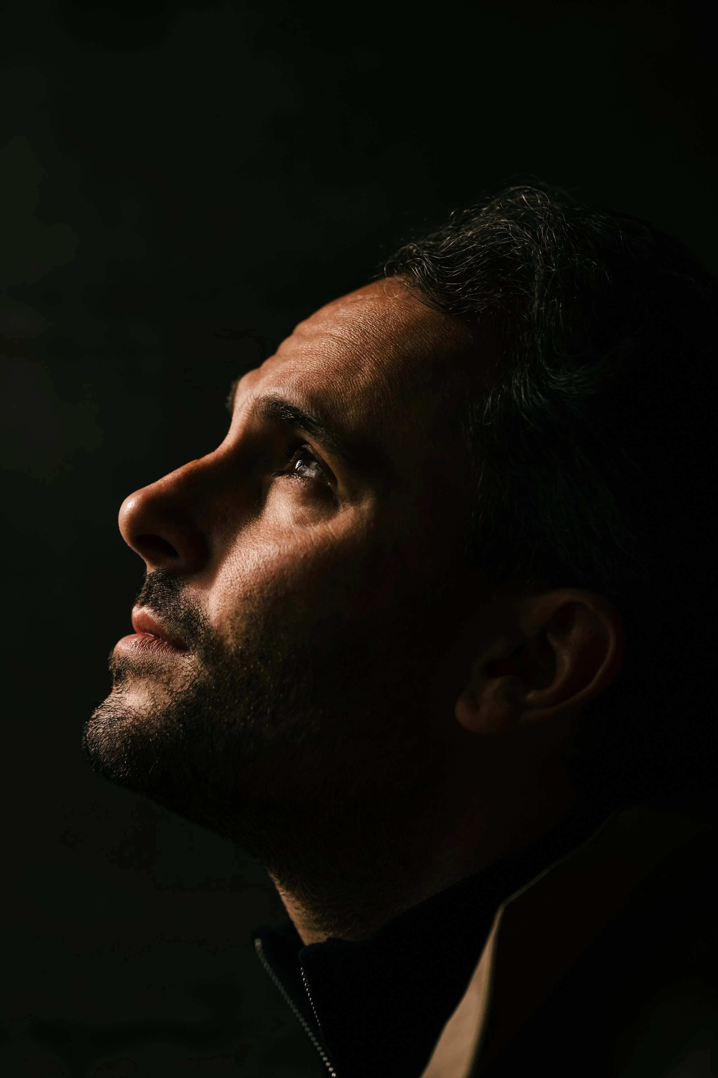 portrait of dennis at entrance of parking garage