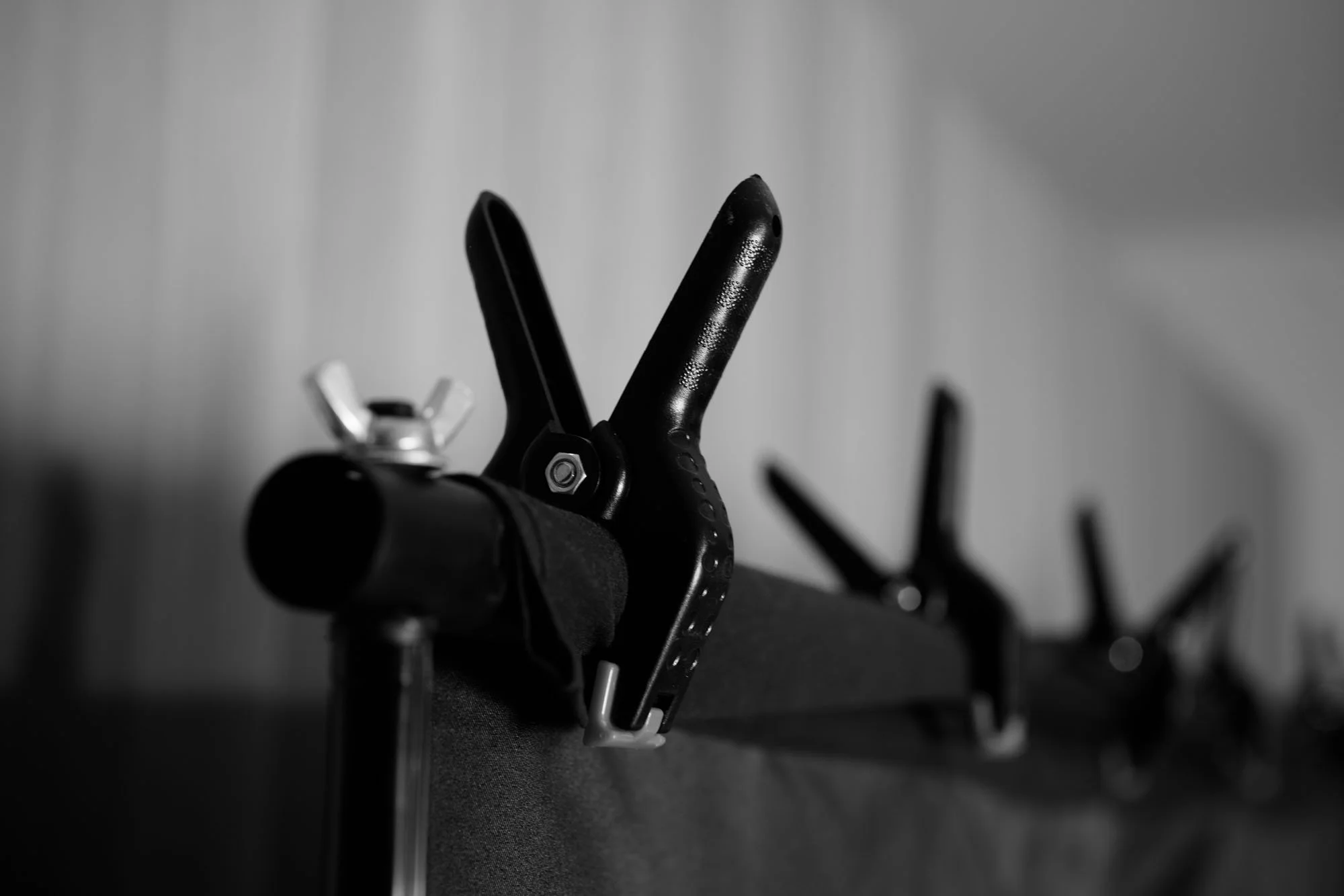 clothespins holding backdrop